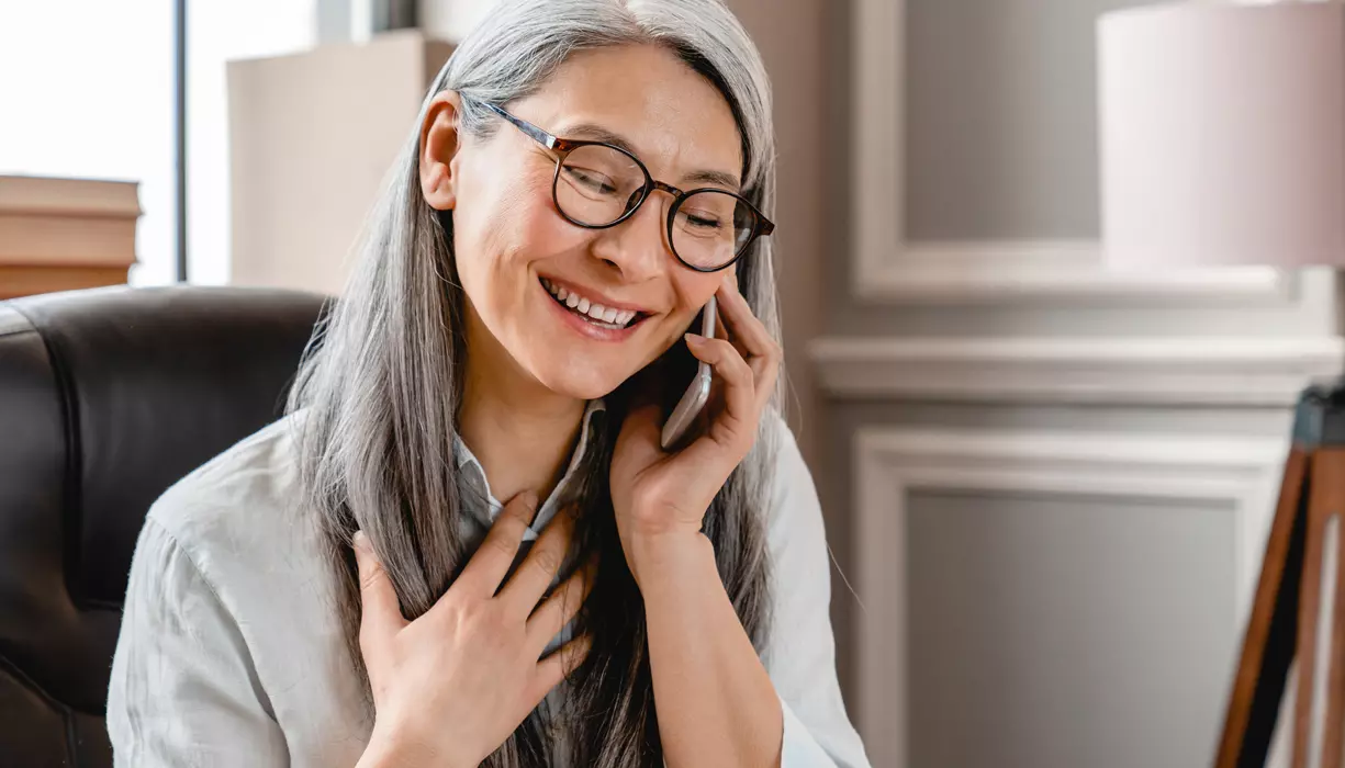 A woman talking on the phone.