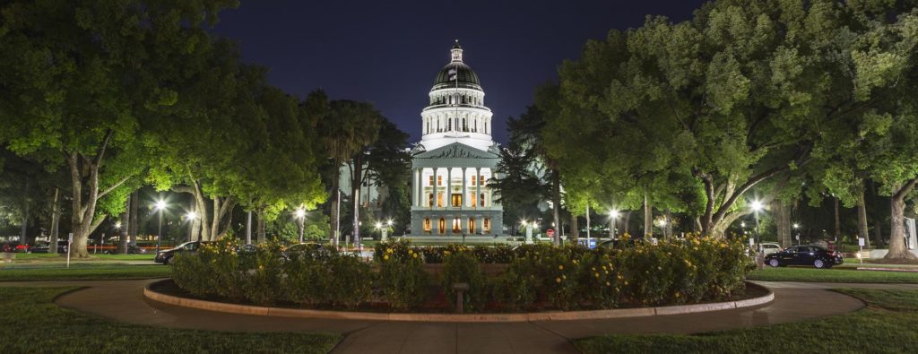Night-View-of-the-California-State-Capitol-Building-Sacramento-1920x741-1024x395
